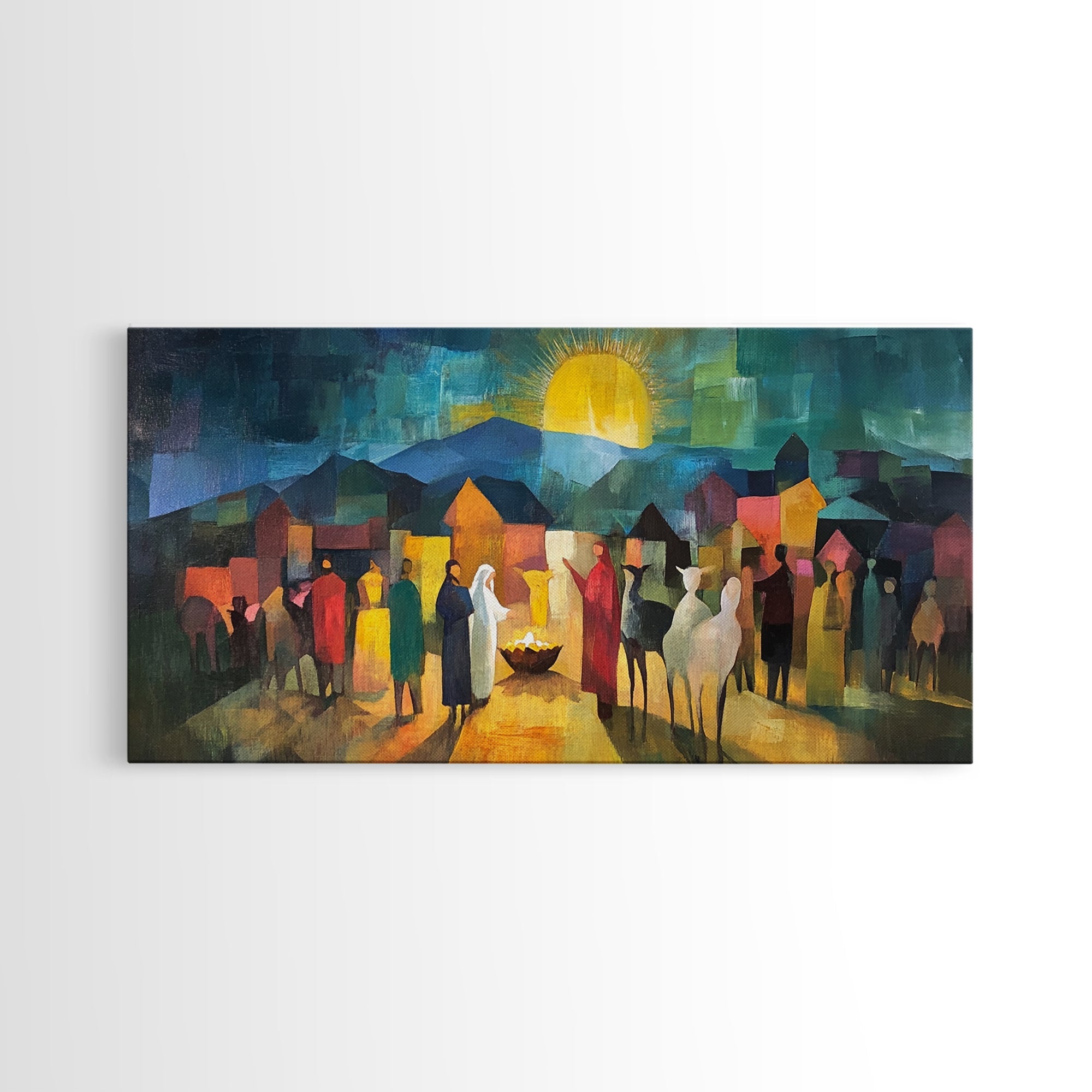 Nativity scene wall art with village buildings, crowd figures, glowing sun, and candlelight