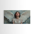 Framed angel canvas print with white wings and pale blue background, dark frame