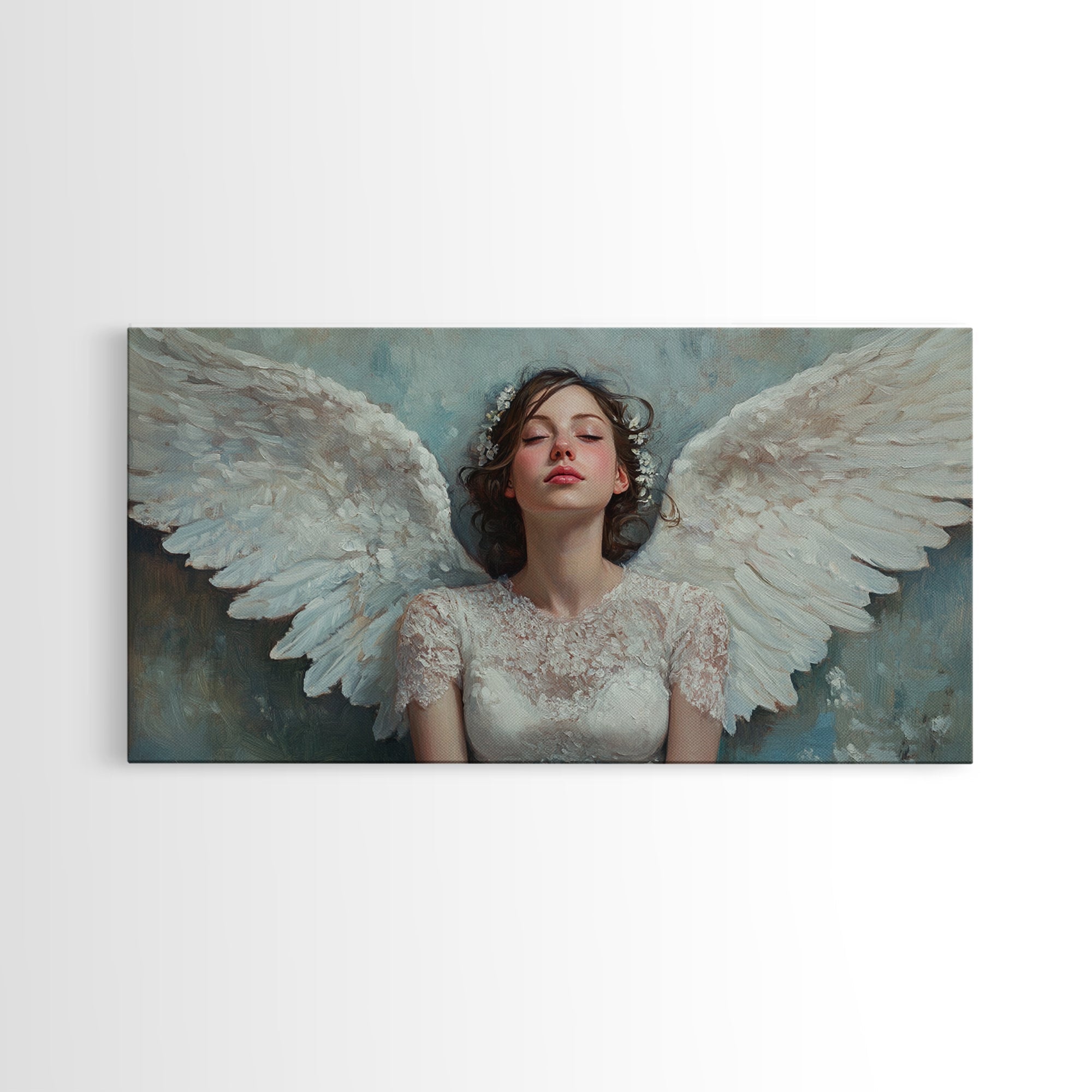 Framed angel canvas print with white wings and pale blue background, dark frame