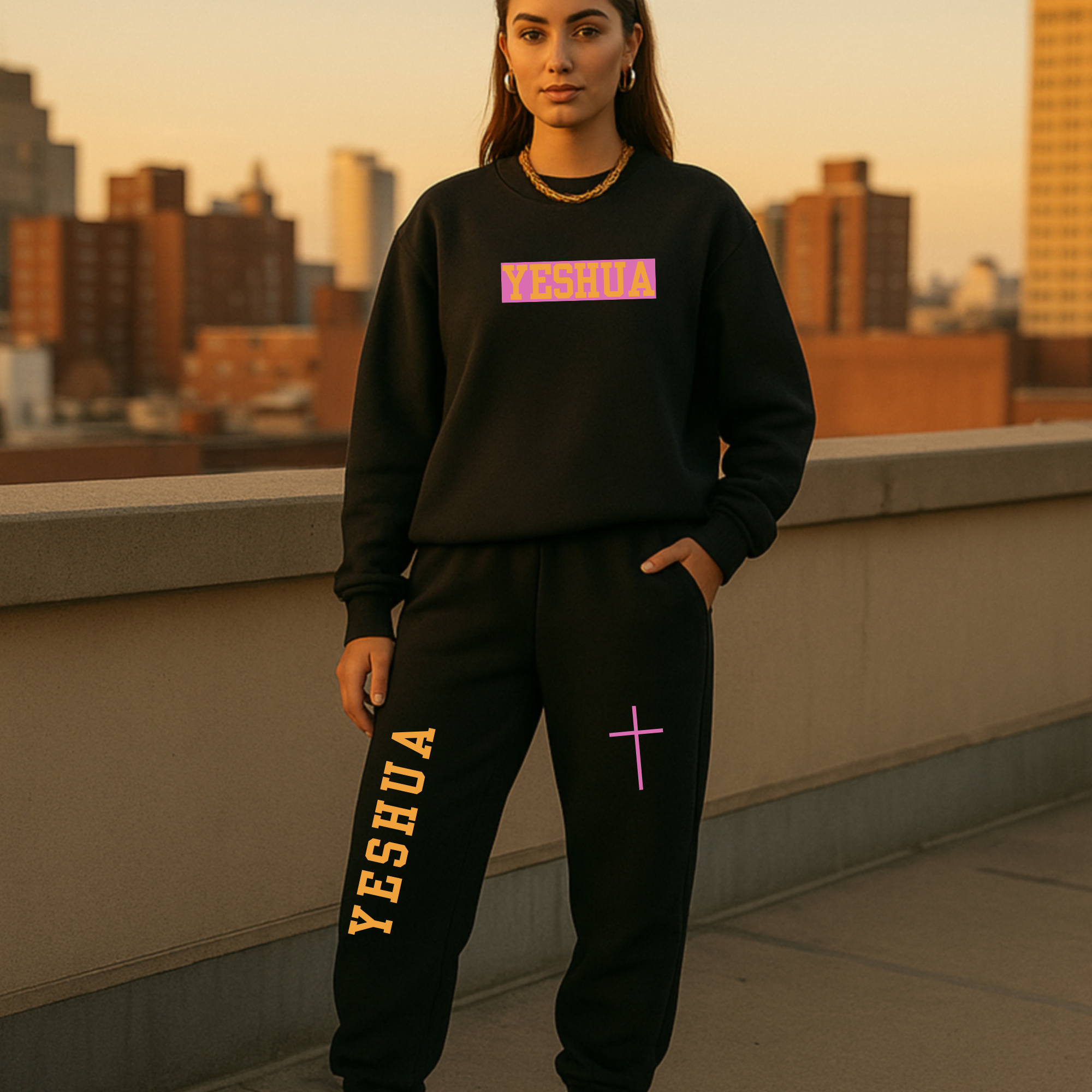 Dark full sweatsuit set with sweatshirt and jogger pants; Yeshua logo and pink cross