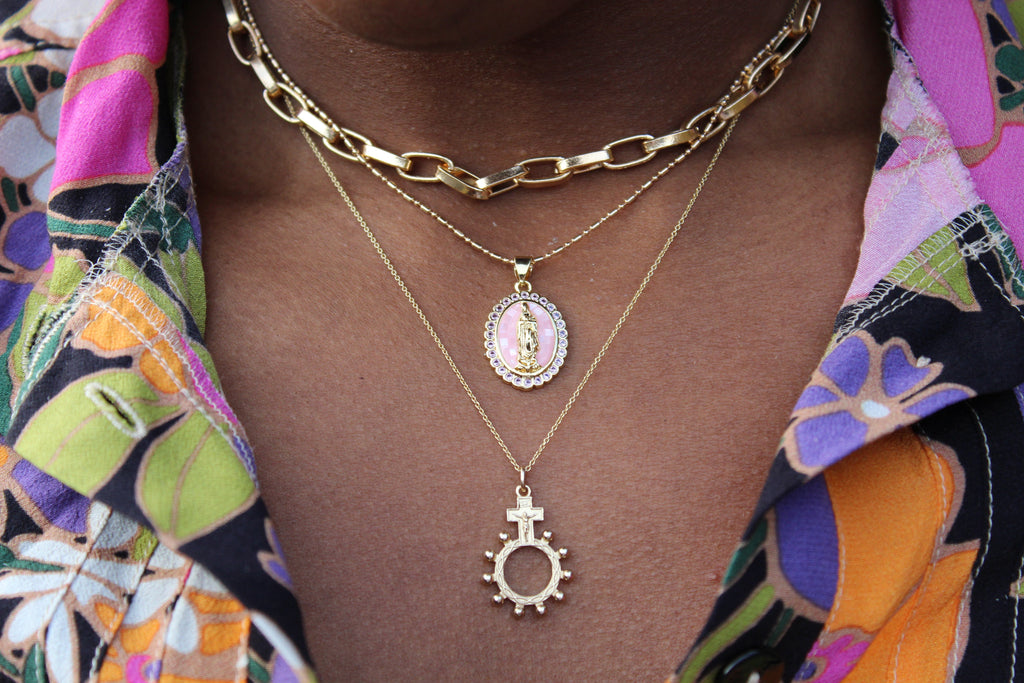 14k gold rosary bead necklace with oval cameo pendant and small bead halo details