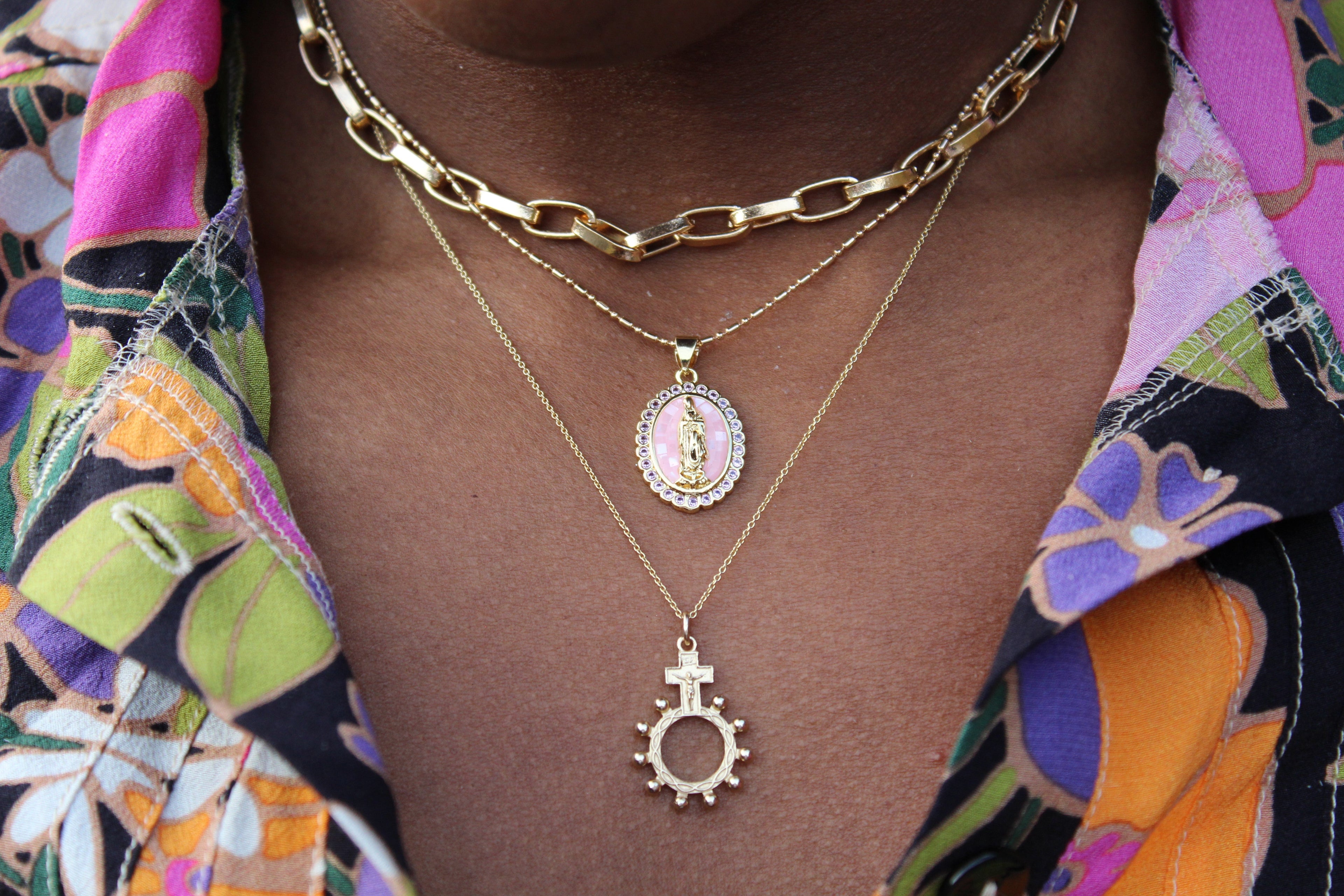 14k gold rosary bead necklace with oval cameo pendant and small bead halo details