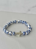 Blue and white beaded cross bracelet with silver cross charm