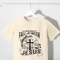 Cream T-shirt with black Fall-o-ween Jesus graphic and cross, crew neck