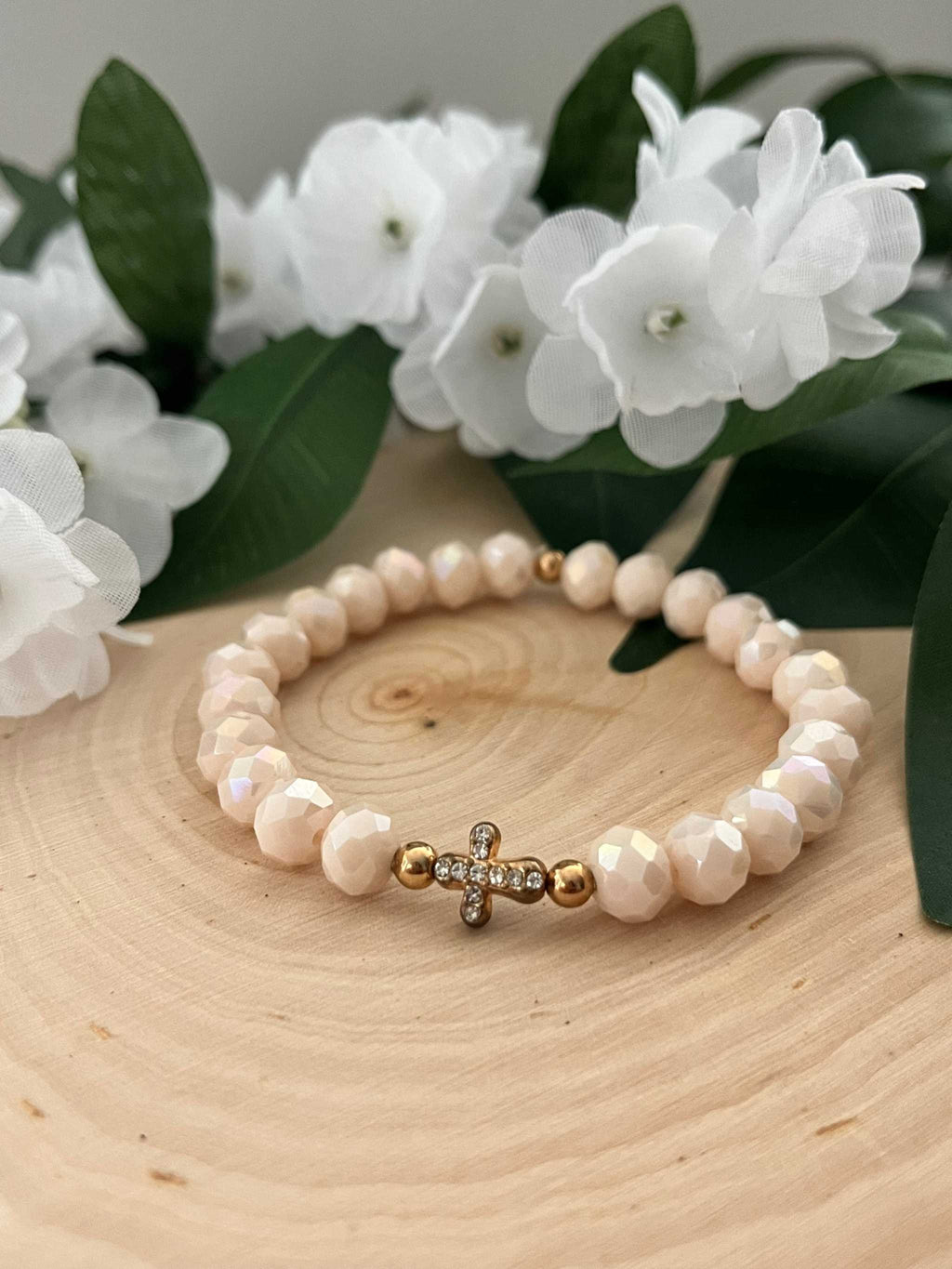 Cream pearl-style bead cross bracelet with gold cross charm