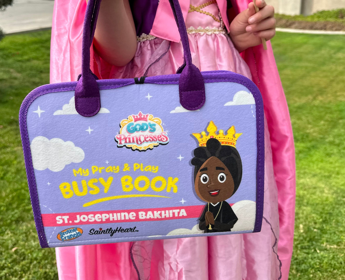 Kids busy book with purple handle, blue cover, and religious princess-themed artwork