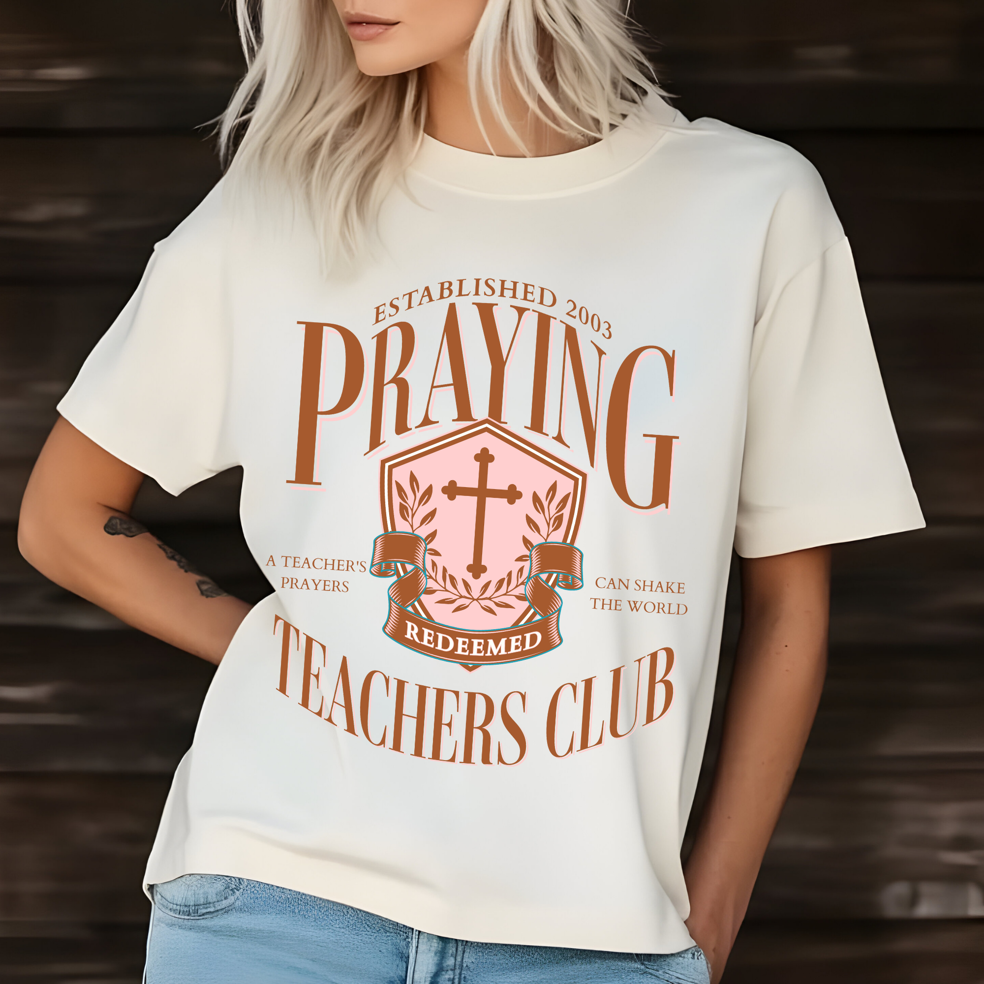 White graphic tee with Praying Teachers Club front print and cross emblem