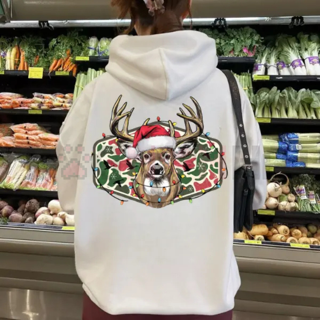 White hoodie back view with Christmas deer camo graphic and over-shoulder strap.
