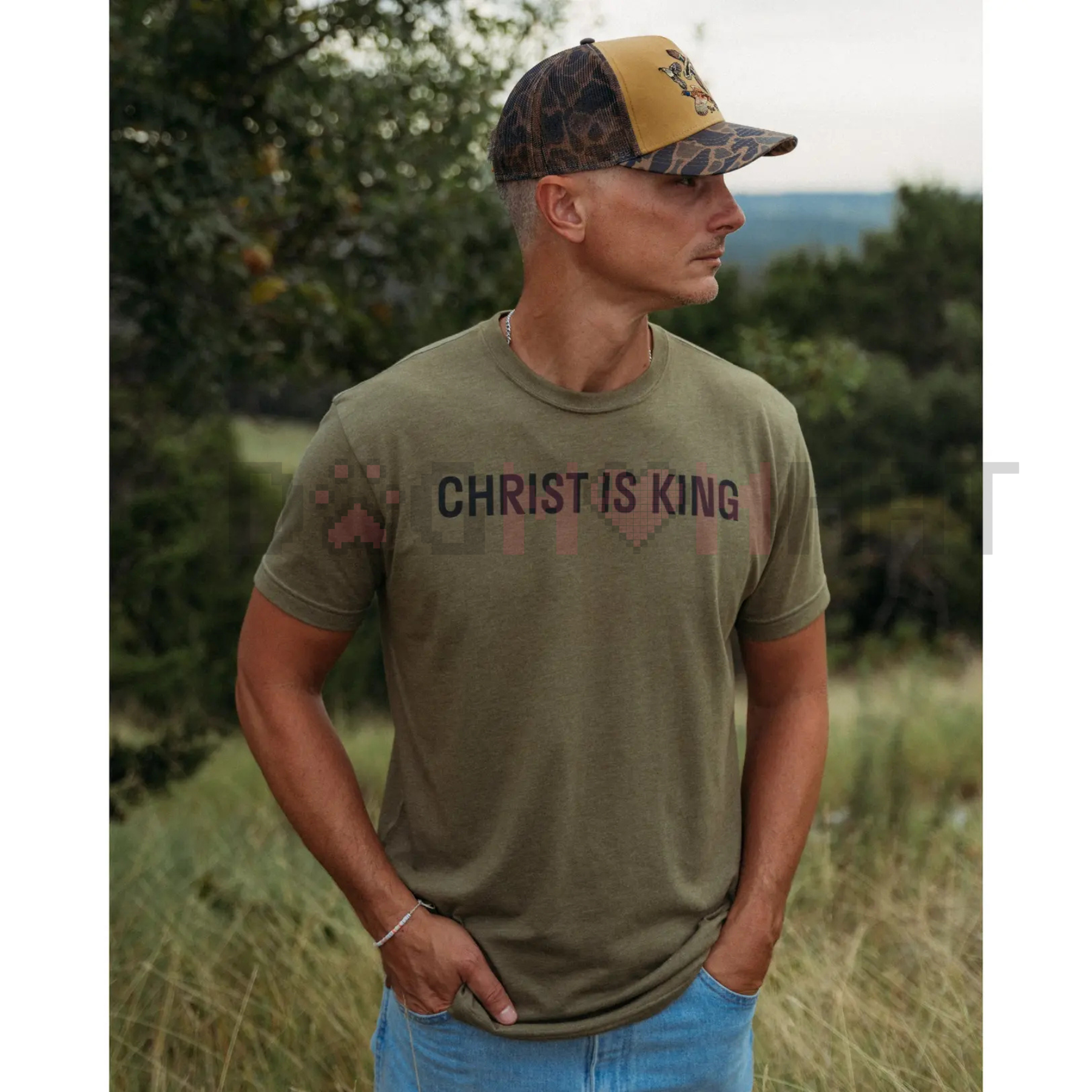 Olive unisex Christian T-shirt with “Christ Is King” front graphic
