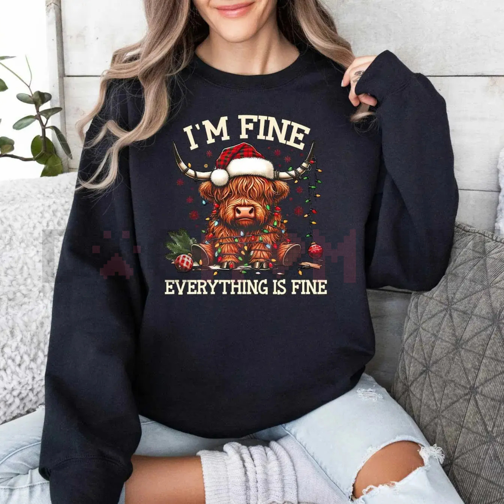 Black crewneck sweatshirt with cow holiday graphic, long sleeves