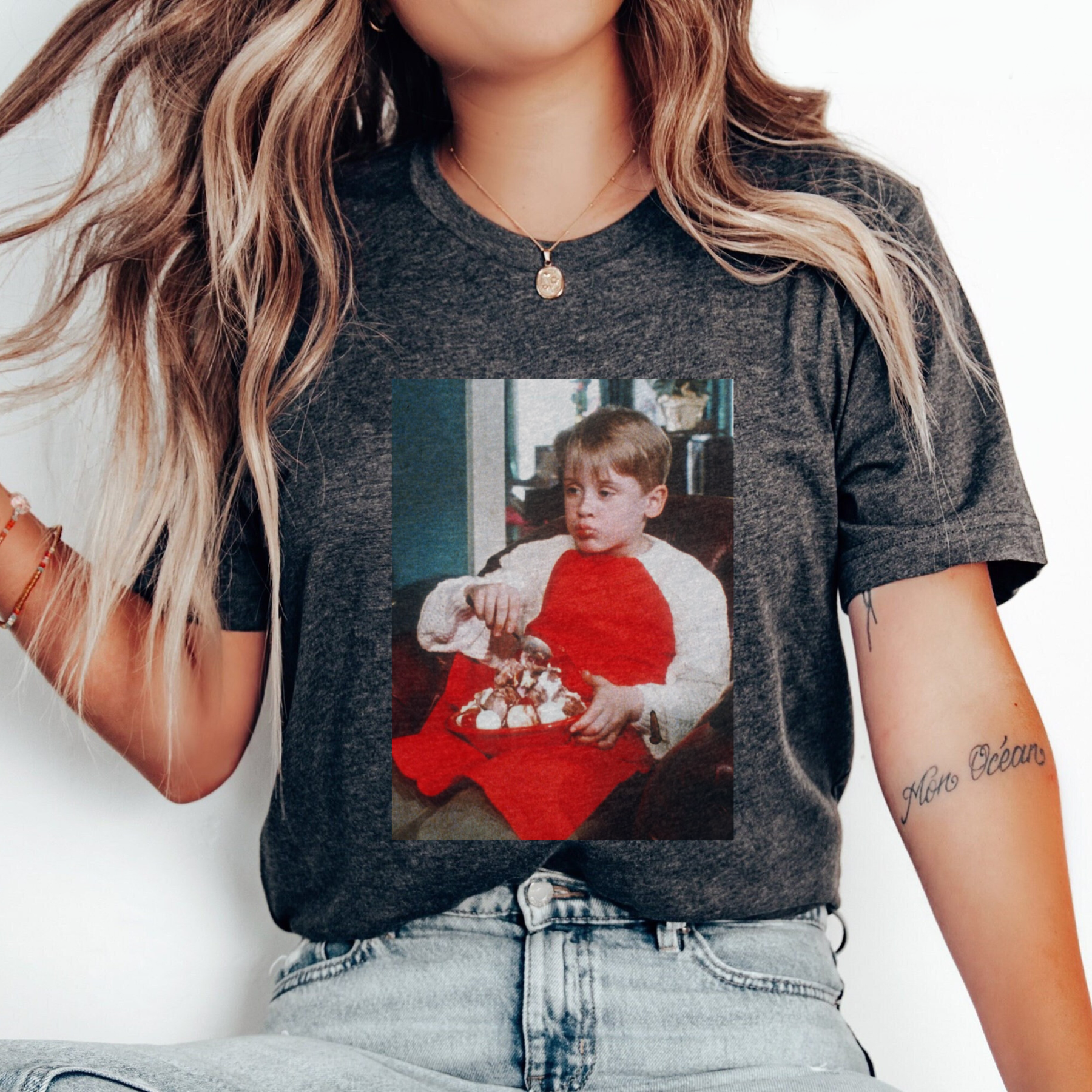 Dark gray Christmas t-shirt with front photo graphic of a boy holding toys