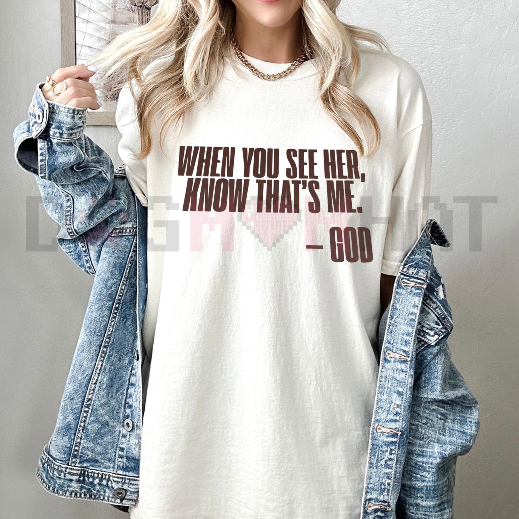 Natural God graphic T-shirt with front text and heart design