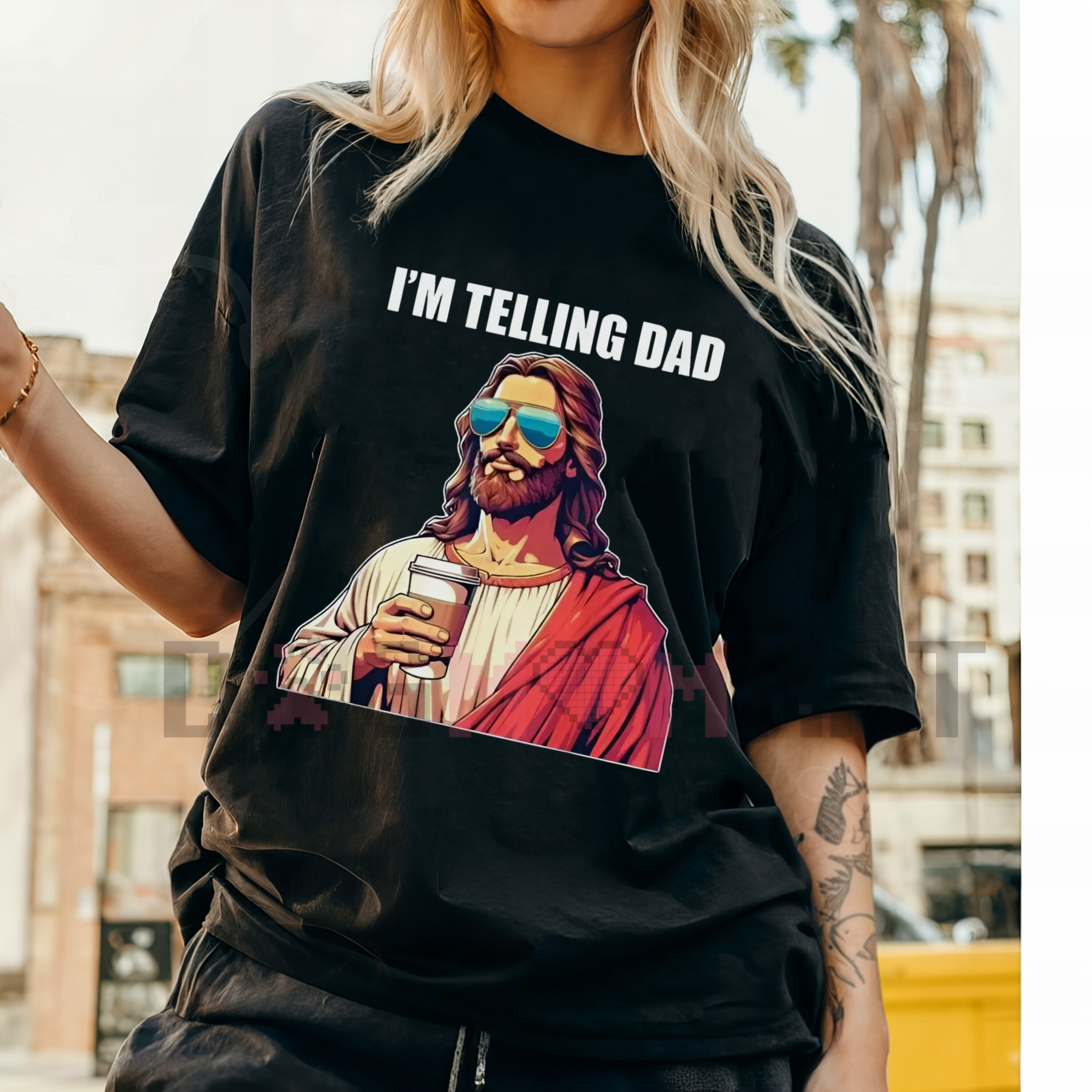 Black T-shirt with "I'M TELLING DAD" text and Jesus-style graphic in red
