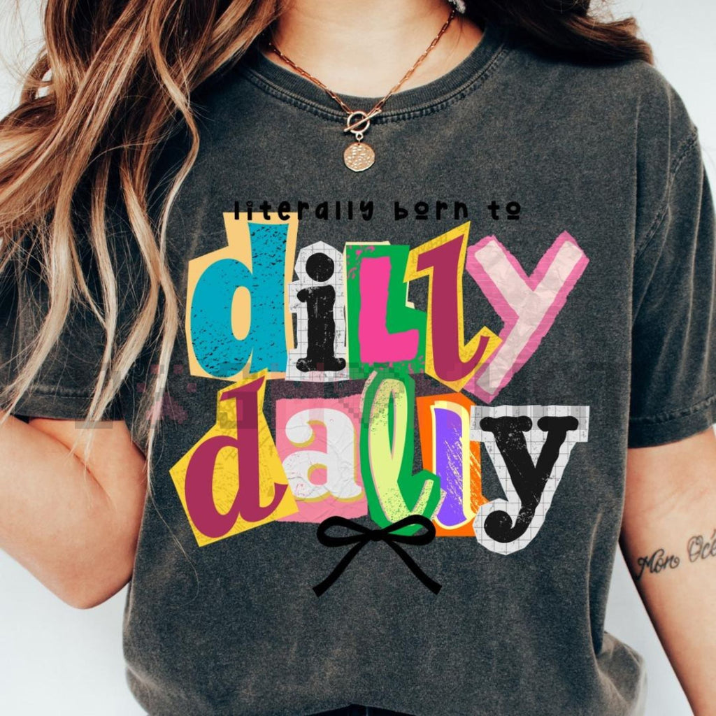 Dark heather gray T-shirt with colorful “literally born to dilly dally” graphic