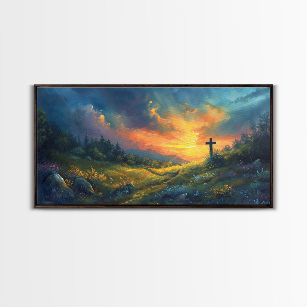 Christian framed canvas wall art featuring a dark cross on a sunset landscape