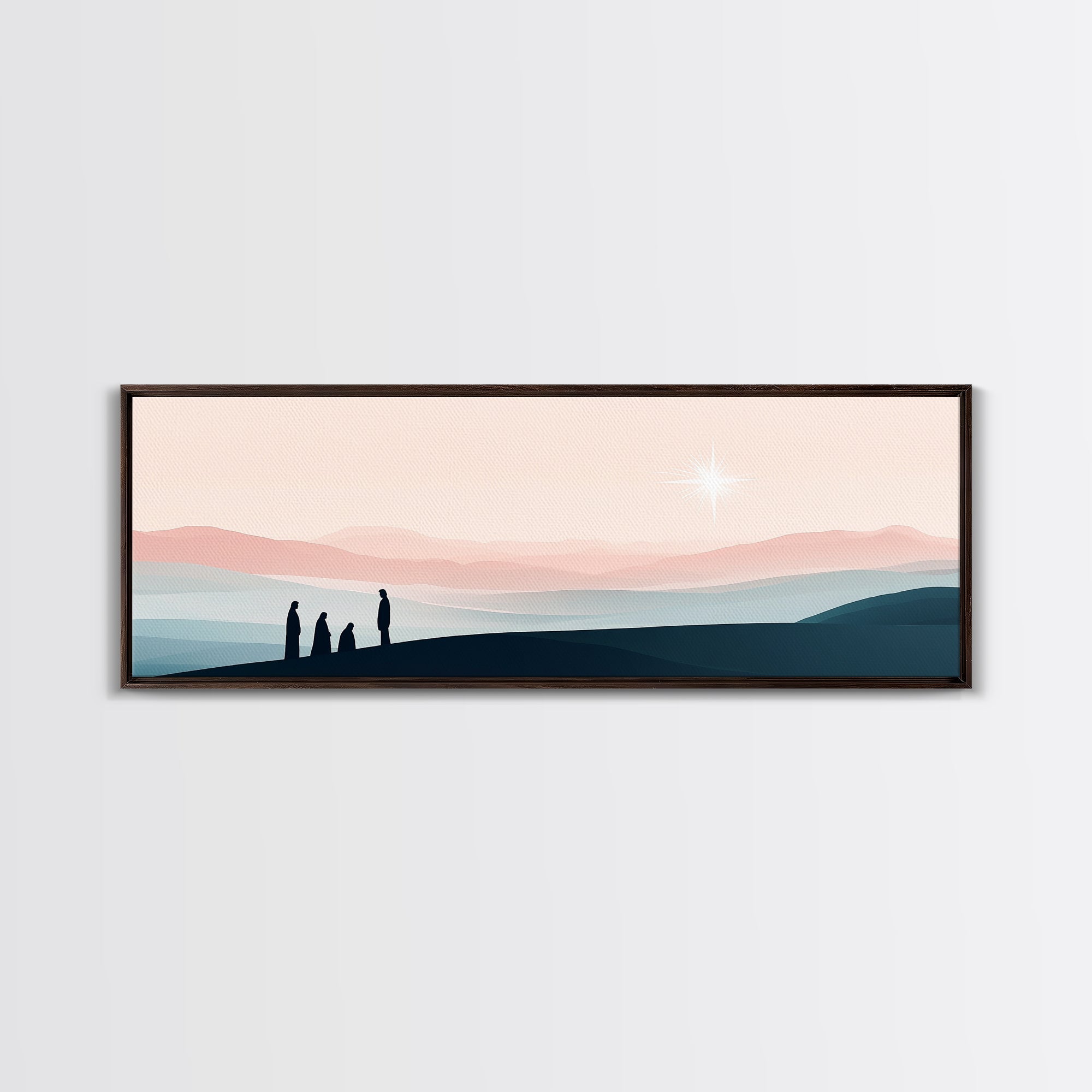 Dark framed canvas print with silhouetted figures, layered hills, and a glowing star