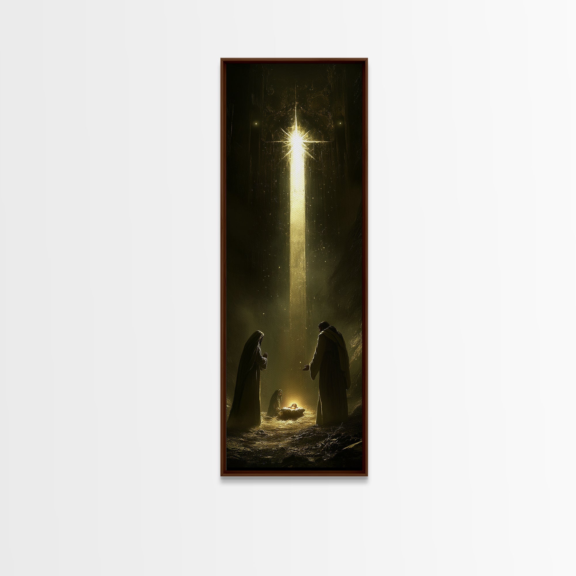 Nativity painting print in a dark frame with glowing star and candlelit manger scene