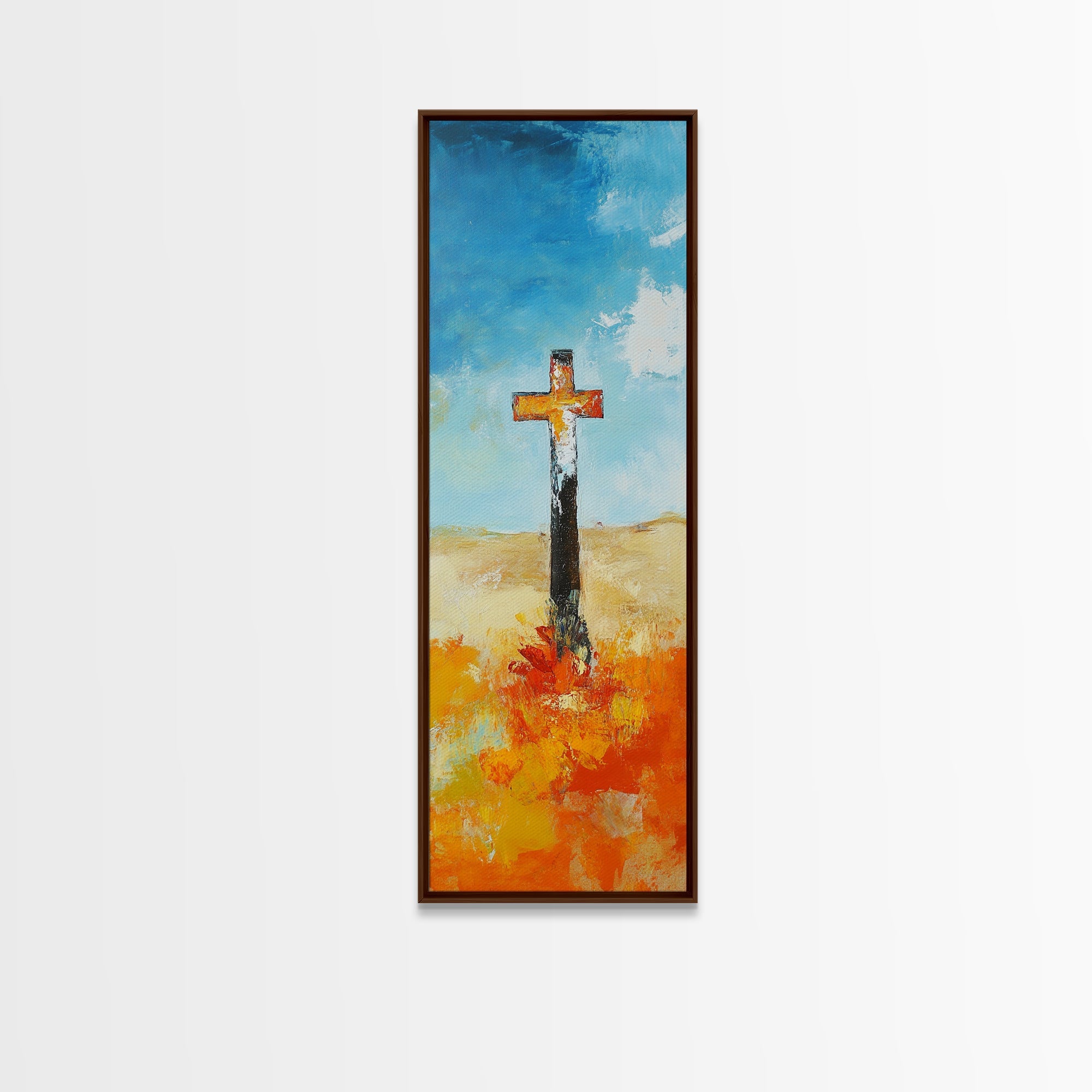 Framed canvas wall art with cross in blue and orange textured paint, dark frame
