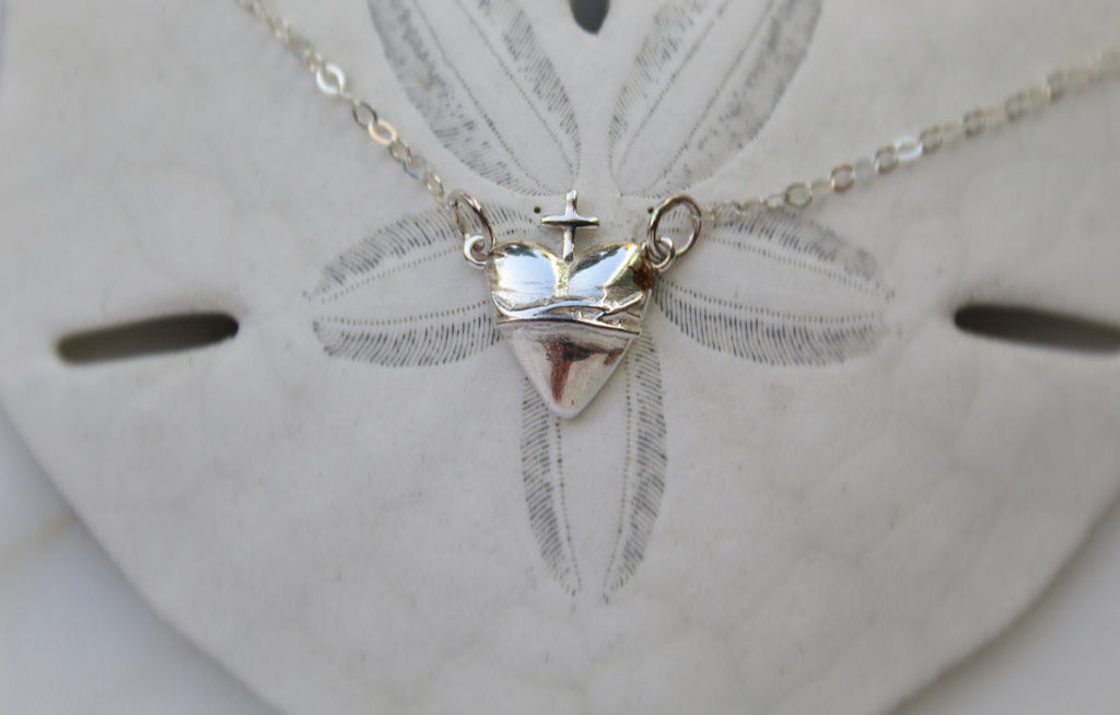 Sterling silver heart pendant with cross and chain, centered view