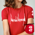 Red T-shirt with white waveform graphic and 45/47 sleeve detail patch