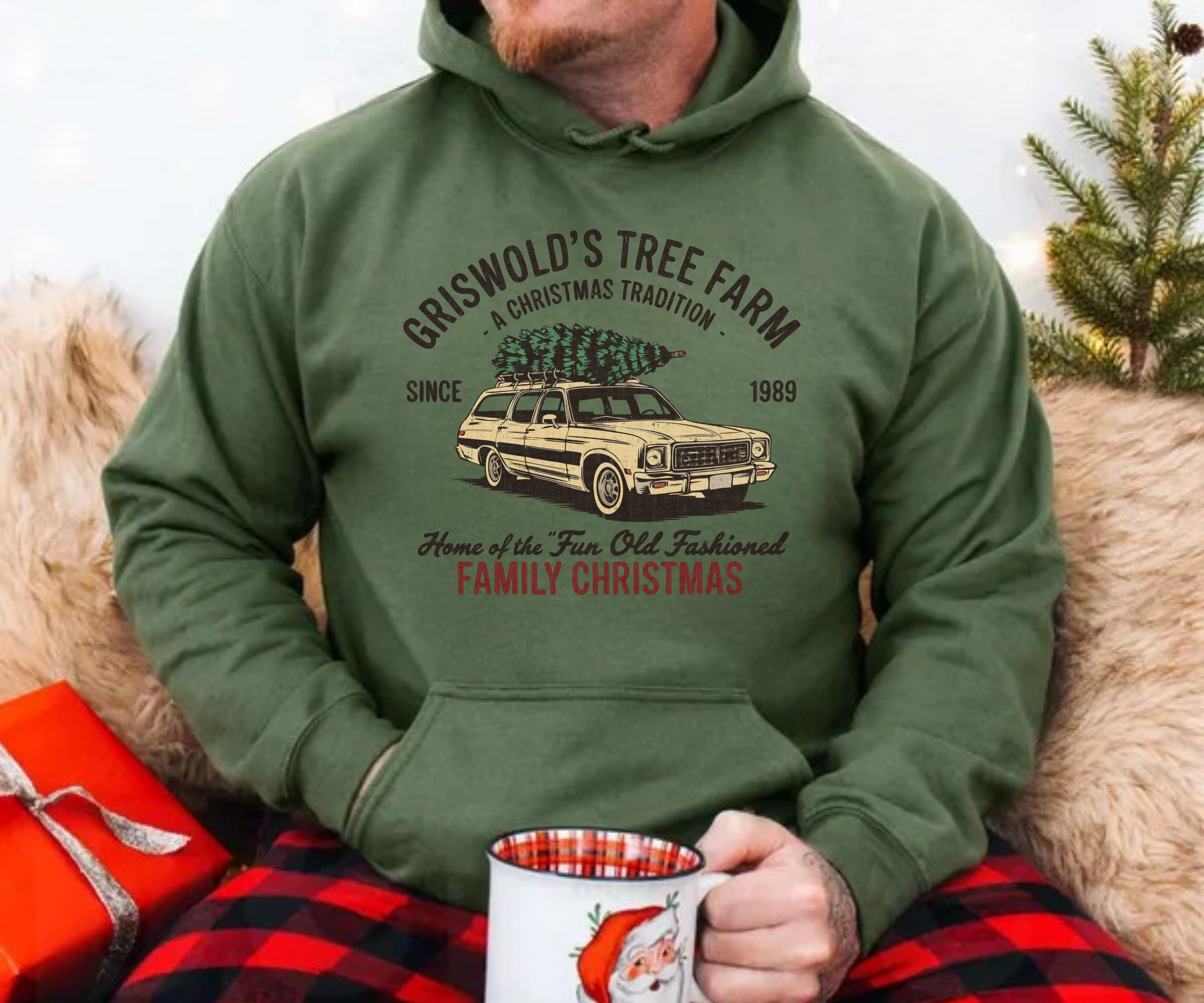 Military green hoodie with front graphic, hood, and kangaroo pocket