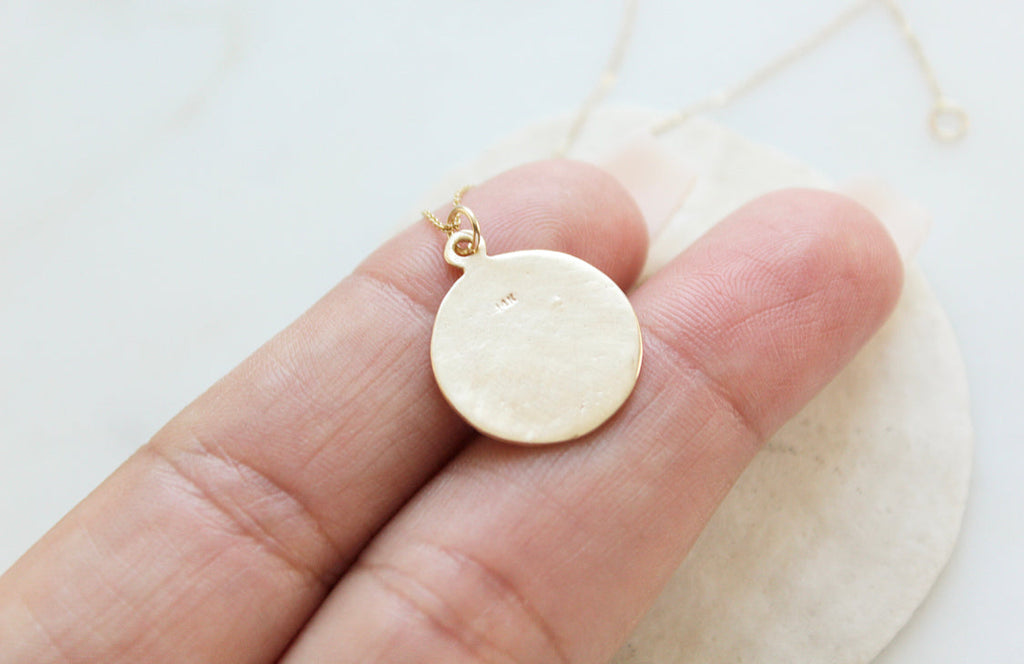 14k gold medallion pendant necklace with Jesus and Mary relief on round disc