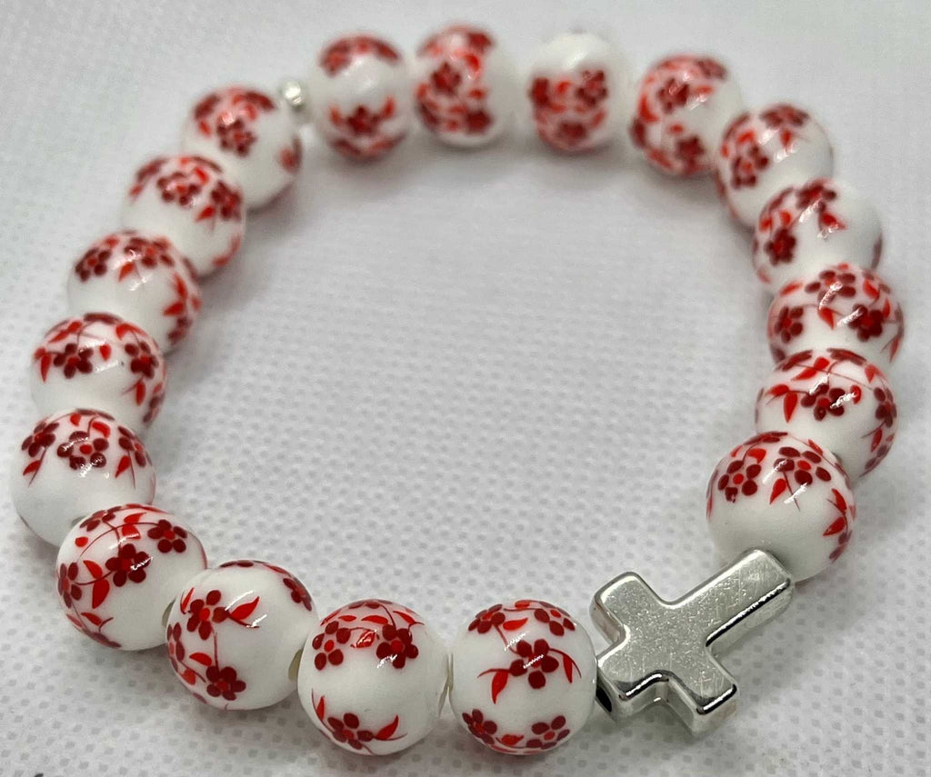 Red and white floral bead cross bracelet with silver cross charm