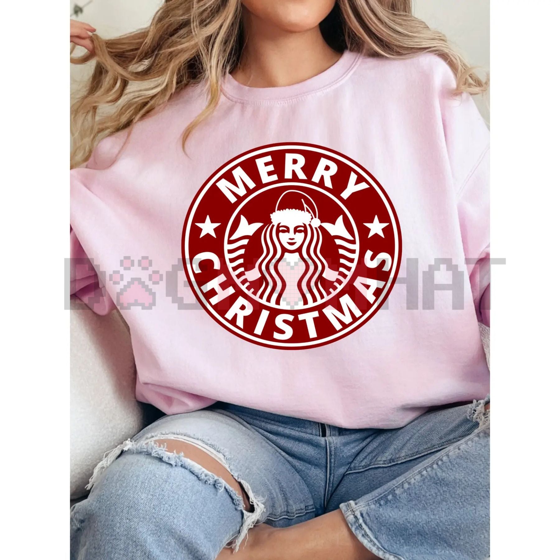 Light pink crewneck sweatshirt with red “Merry Christmas” graphic emblem