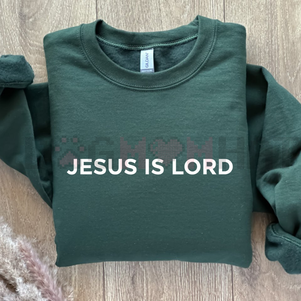 Forest green sweatshirt with white 'JESUS IS LORD' text, crew neck and long sleeves
