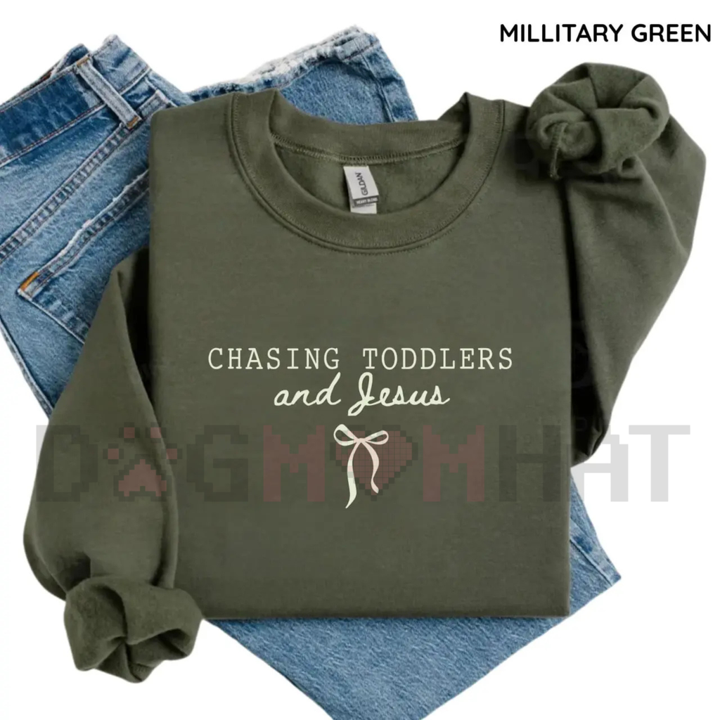 Military green sweatshirt with puff sleeves and 'Chasing Toddlers and Jesus' graphic