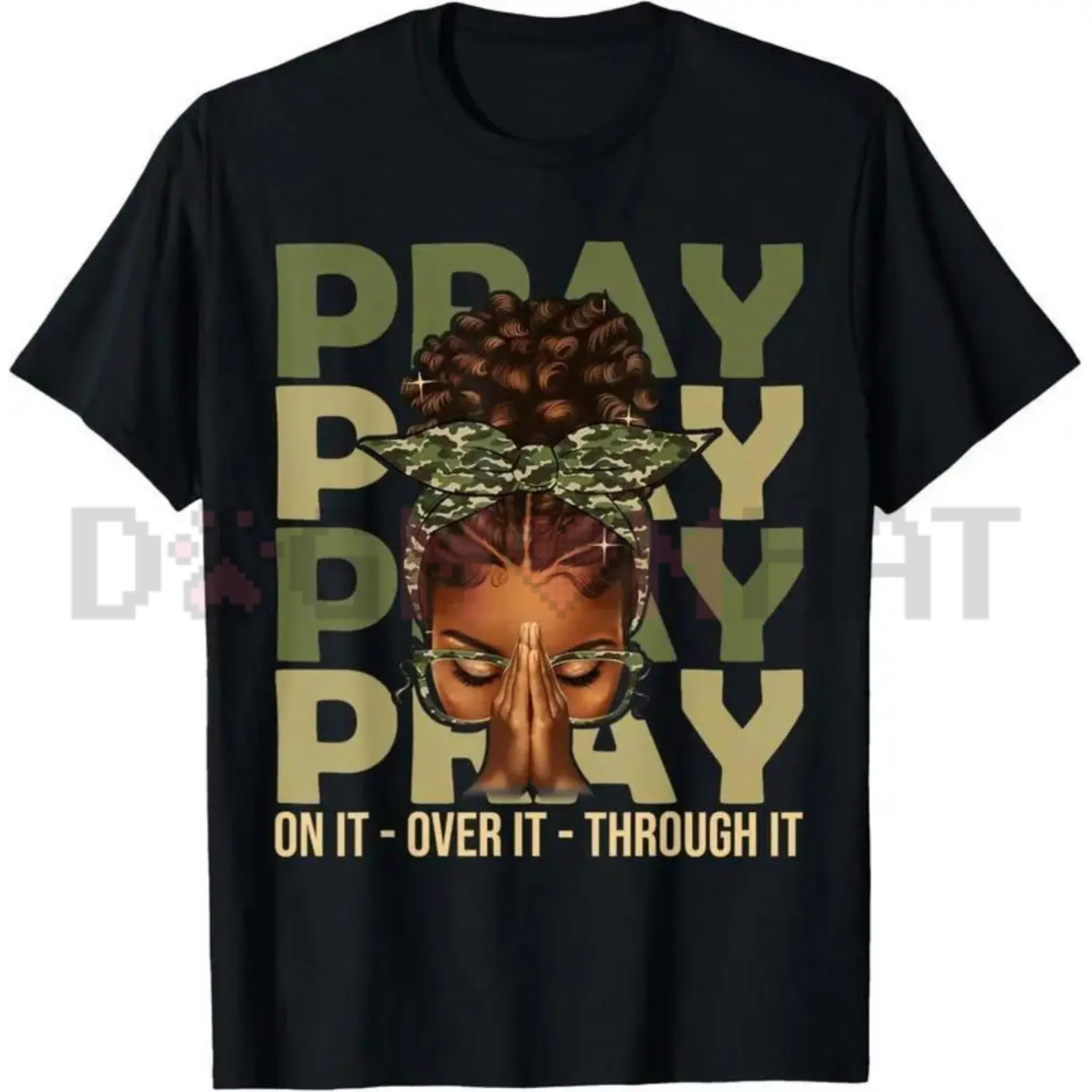 Black crewneck T-shirt close-up: “PRAY” text with face and camouflage headpiece