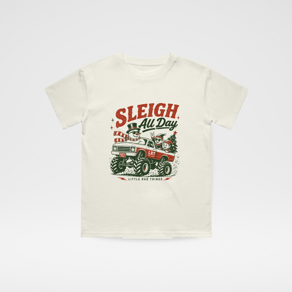 Cream toddler Christmas t-shirt with “Sleigh All Day” monster truck graphic