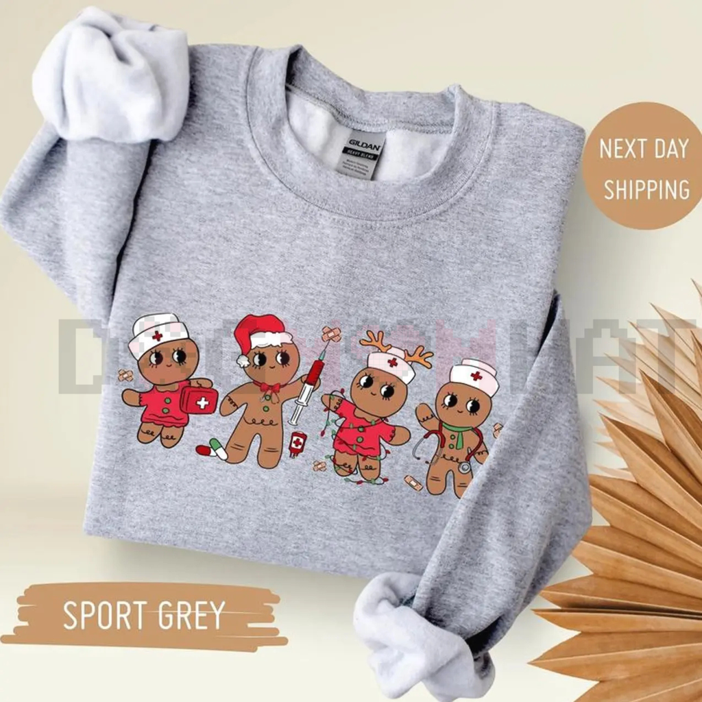 Sport grey sweatshirt with cartoon gingerbread nurse characters graphic on front, crew neck