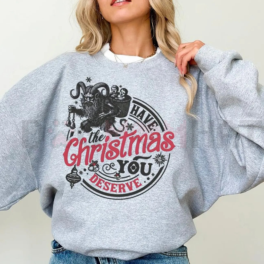 Light gray sweatshirt with gothic front graphic: “Have the Christmas you deserve”.