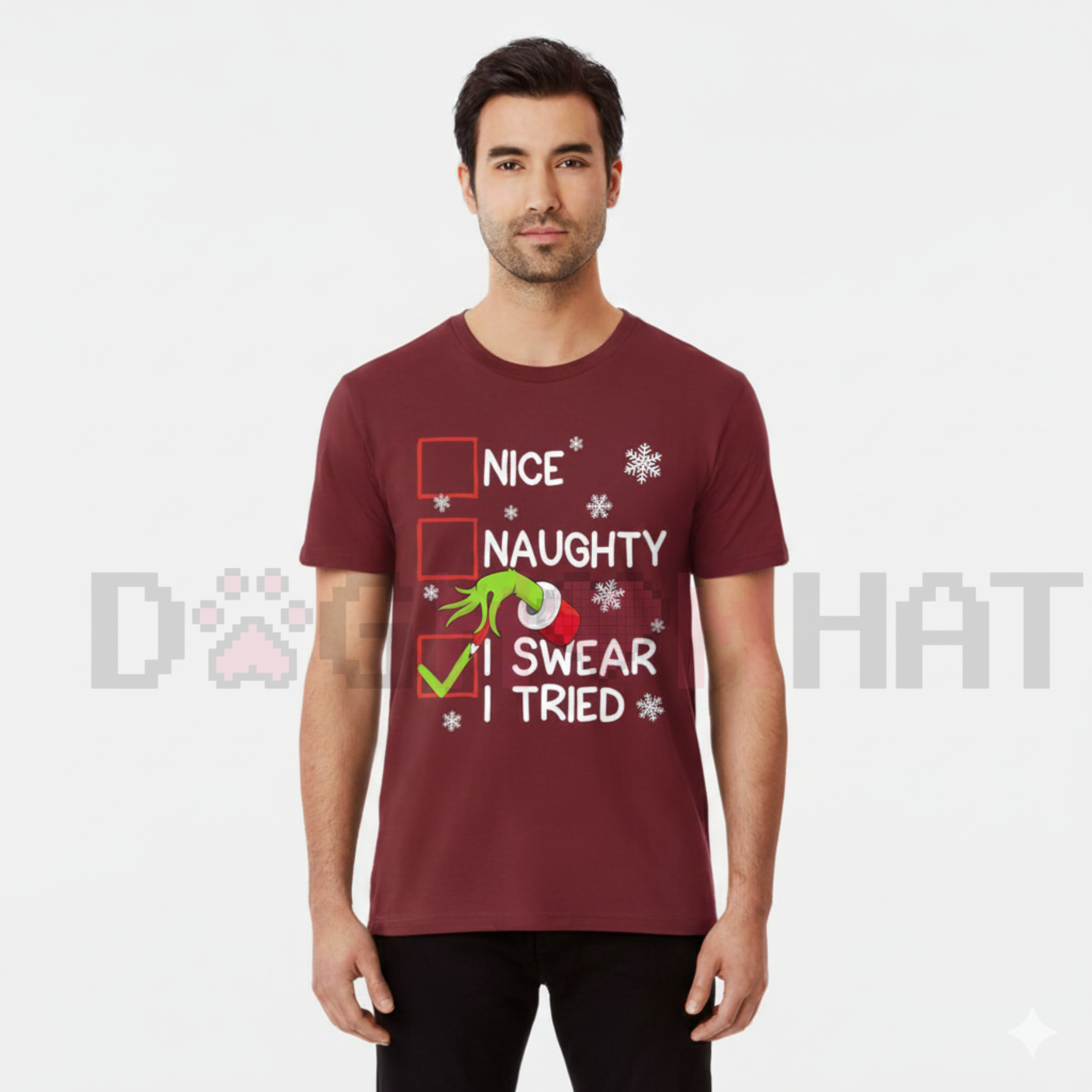 Maroon unisex Christmas graphic tee with 'Nice', 'Naughty', and 'I Swear I Tried' print