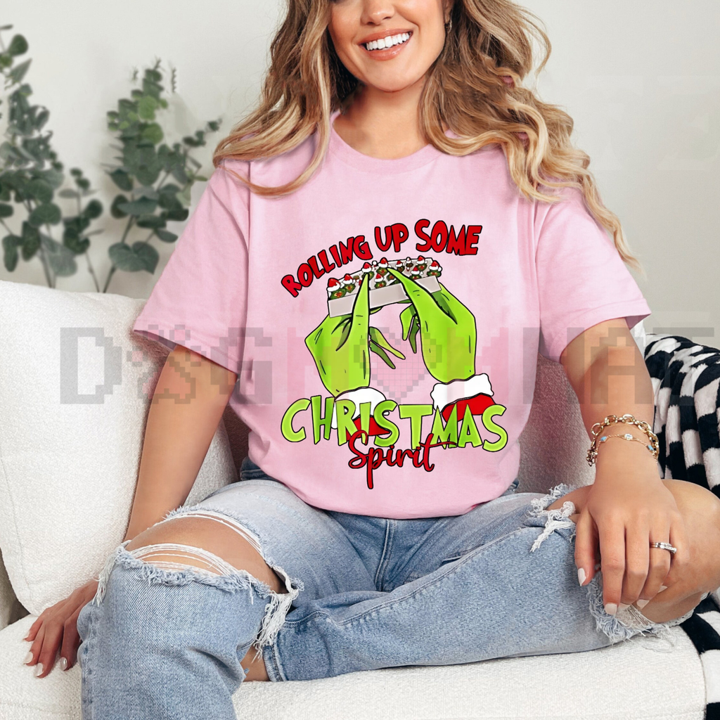 Light pink T-shirt with Grinch hands Christmas graphic, crew neck short sleeves