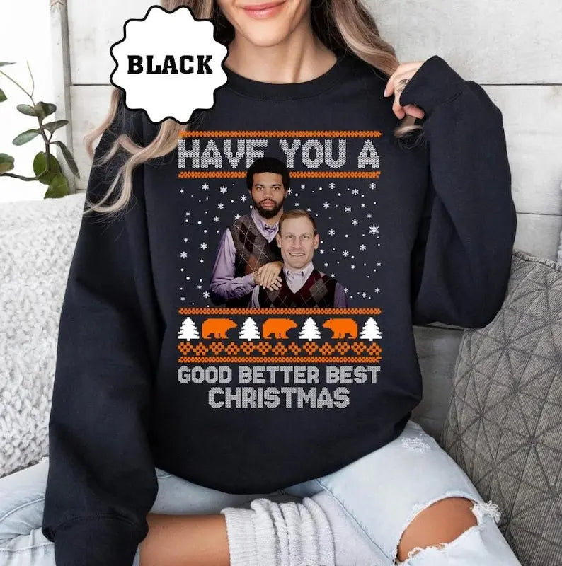 Black ugly Christmas sweater with long sleeves and festive graphic front