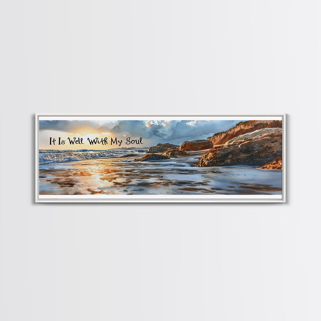 Coastal beach wall art canvas in gold-toned frame with scripture text and rocky shoreline