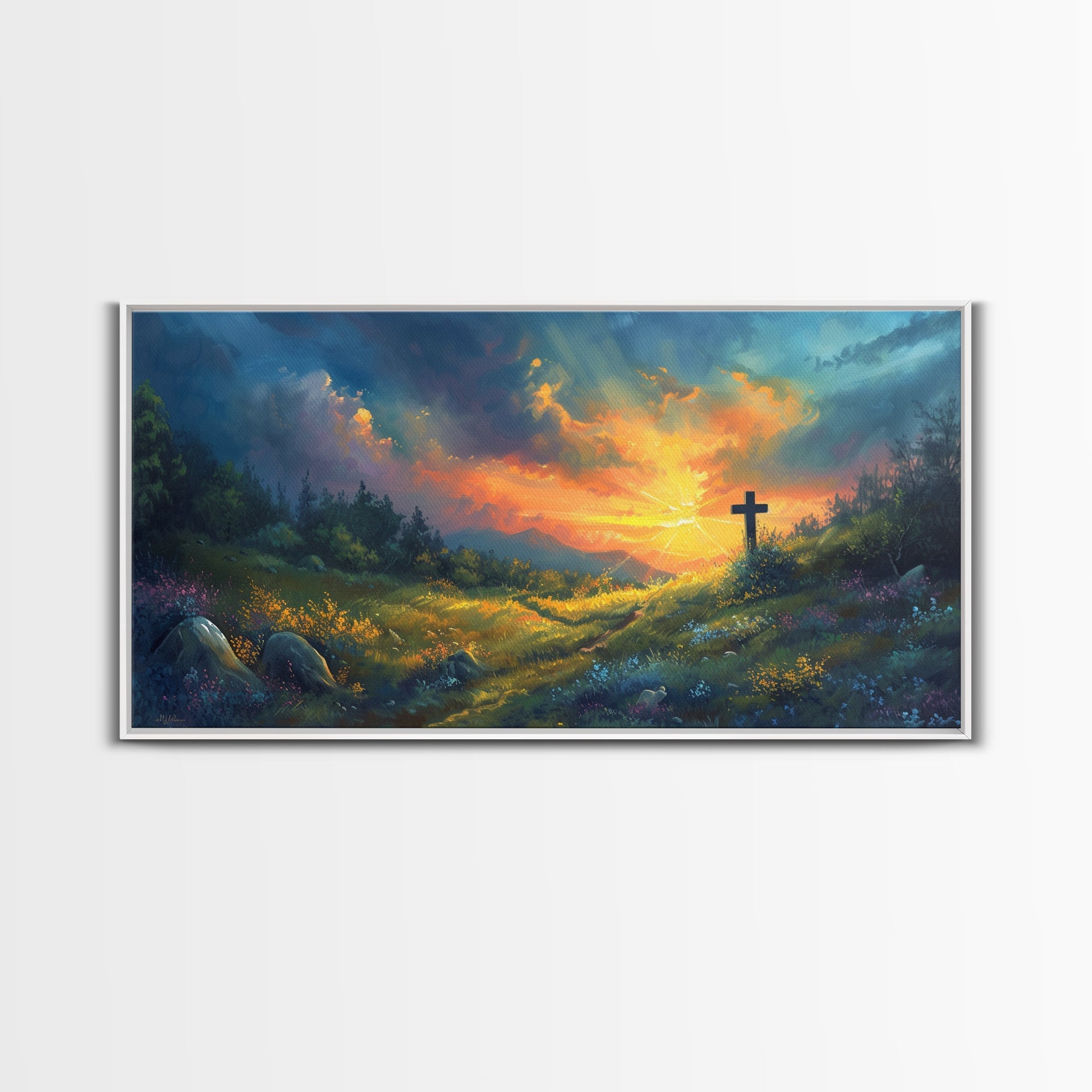 Christian framed canvas wall art showing a dark cross over a colorful sunset landscape