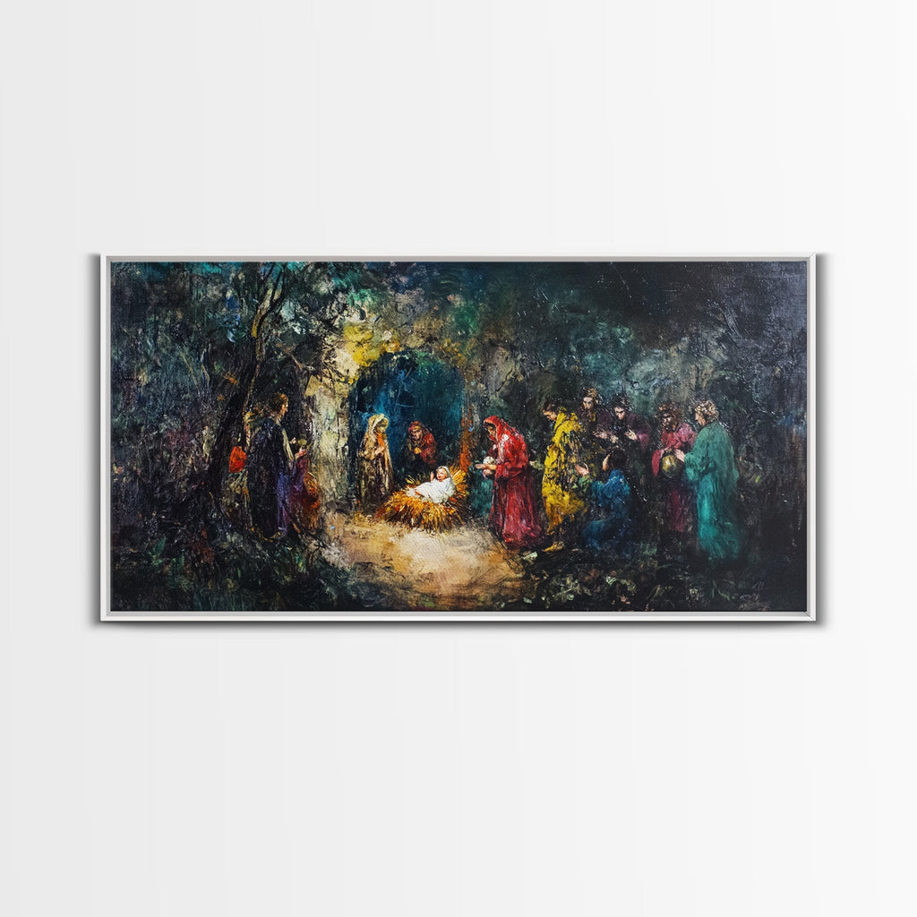 Framed abstract nativity canvas artwork with multicolored figures and a soft golden light