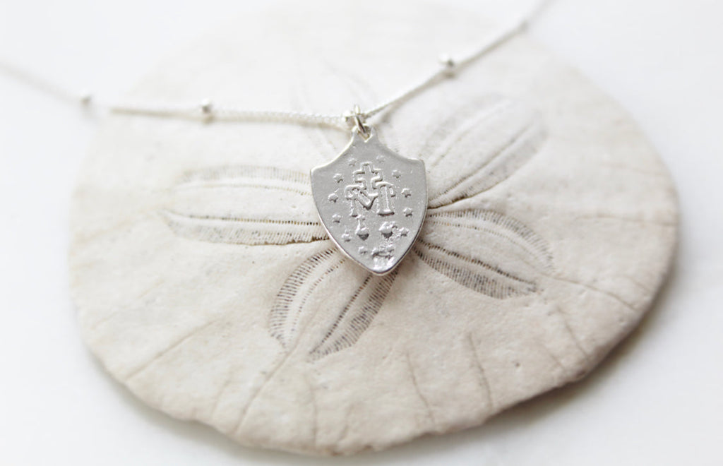 Sterling silver shield pendant necklace with etched back design on ball chain