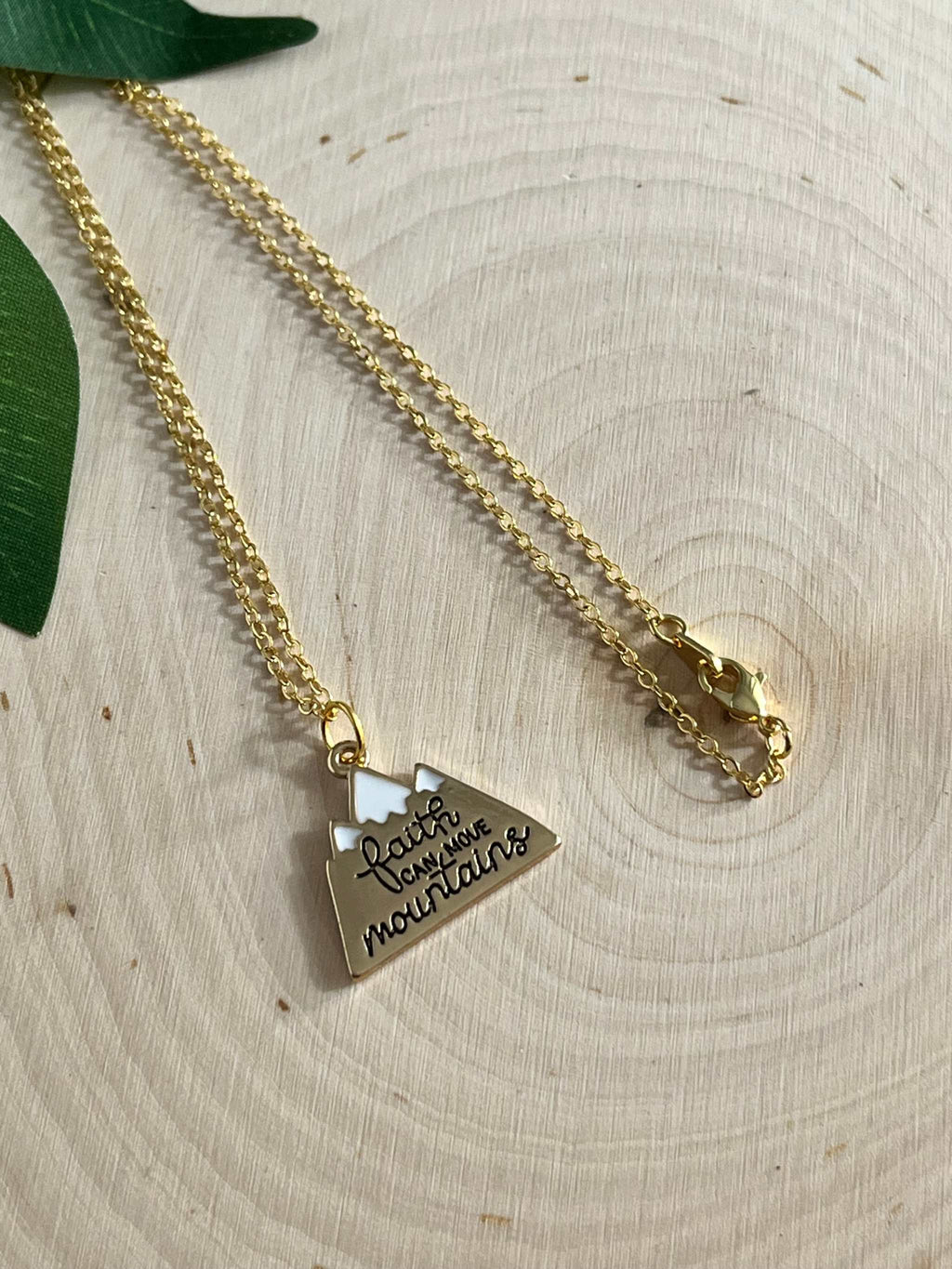 Gold chain necklace with heart pendant charm and clasp detail, scripture engraved