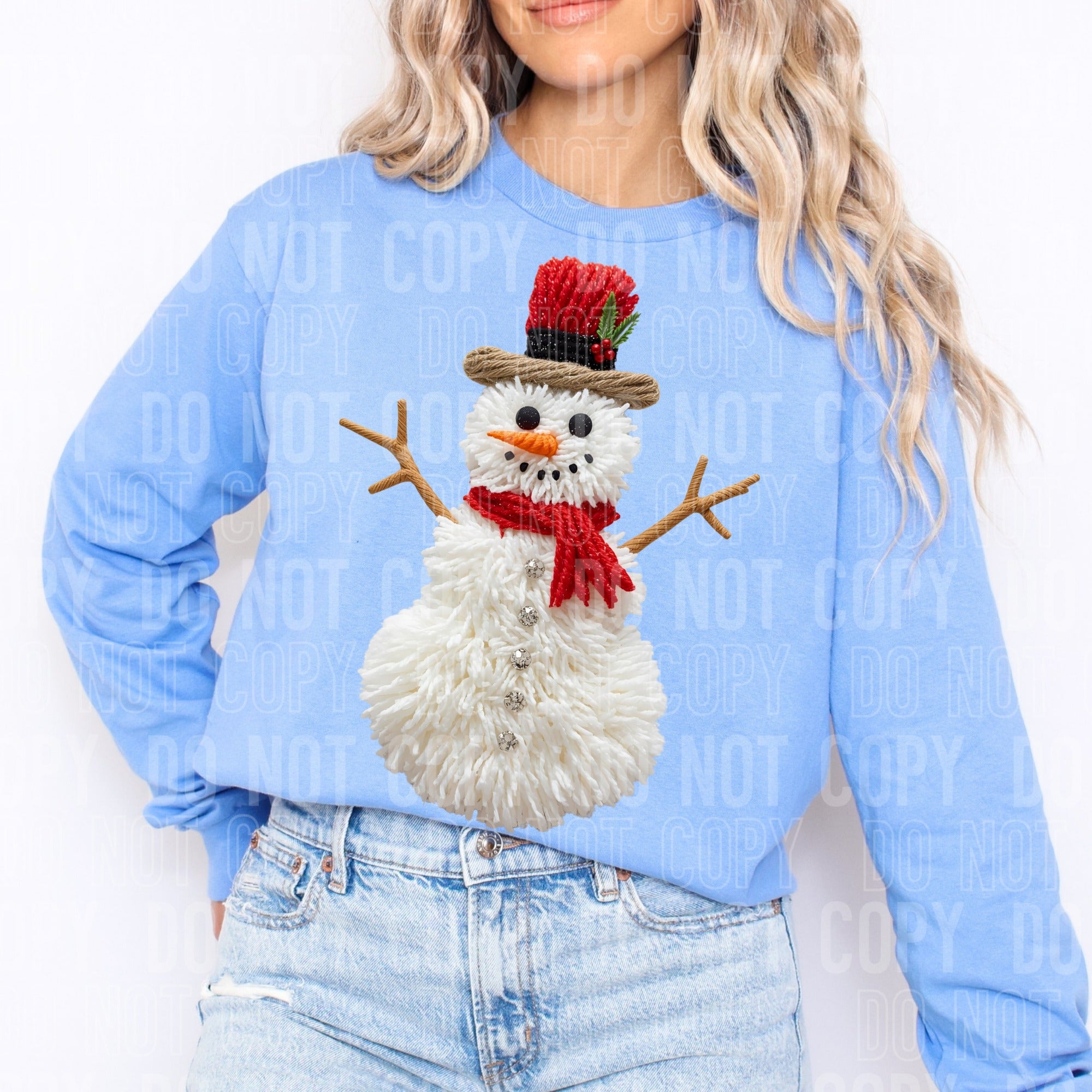 Light blue faux yarn snowman sweatshirt worn by model; full front snowman with red accents
