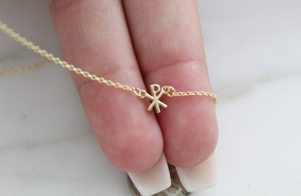 14K gold necklace with Chi Rho pendant charm on a fine chain