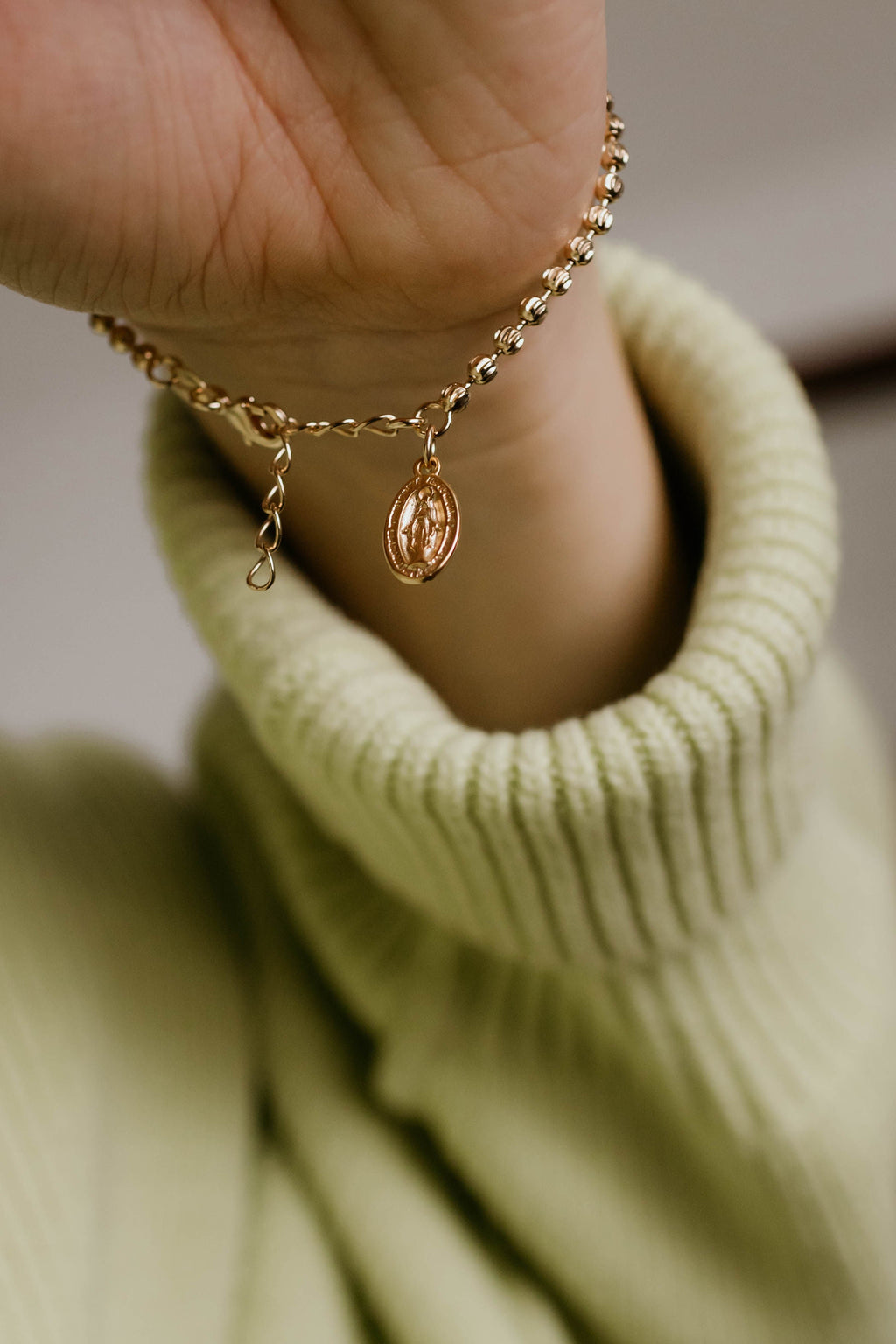 Gold-tone chain bracelet with oval Miraculous medal charm