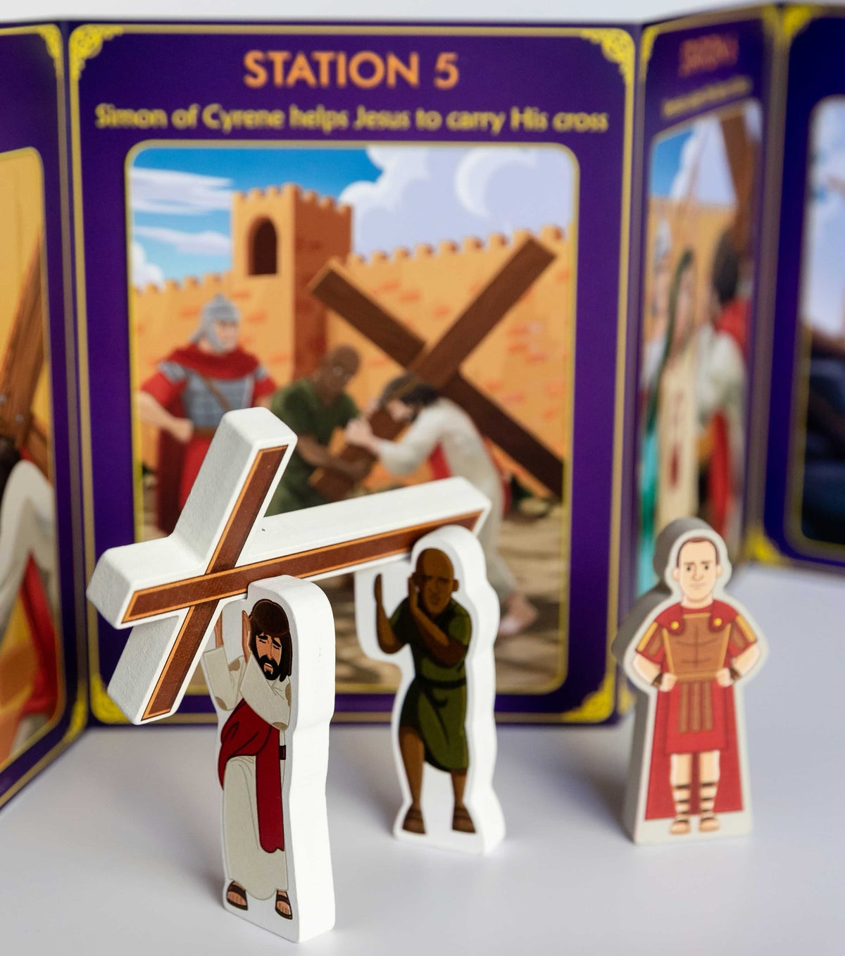 Station 5 card with figures and a wooden cross centerpiece plus character cutouts
