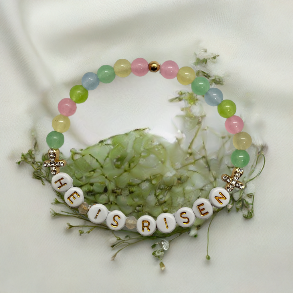 Pastel multicolor bead bracelet with “HE IS RISEN” and gold cross charms
