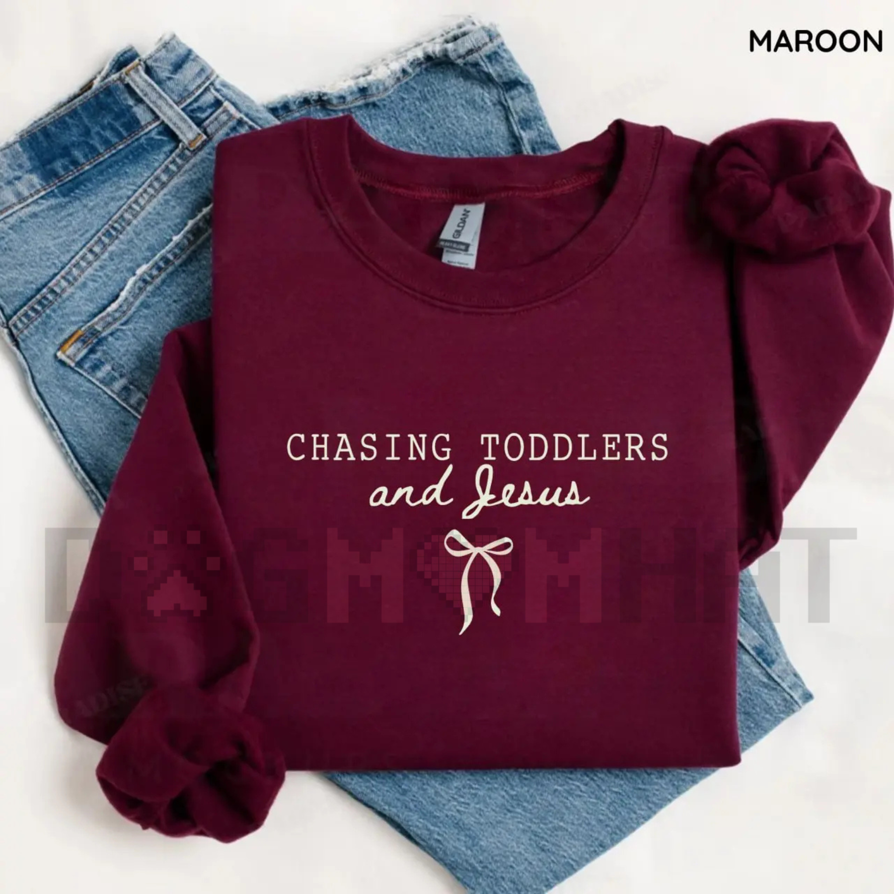 Maroon sweatshirt with puff sleeves and 'Chasing Toddlers and Jesus' graphic