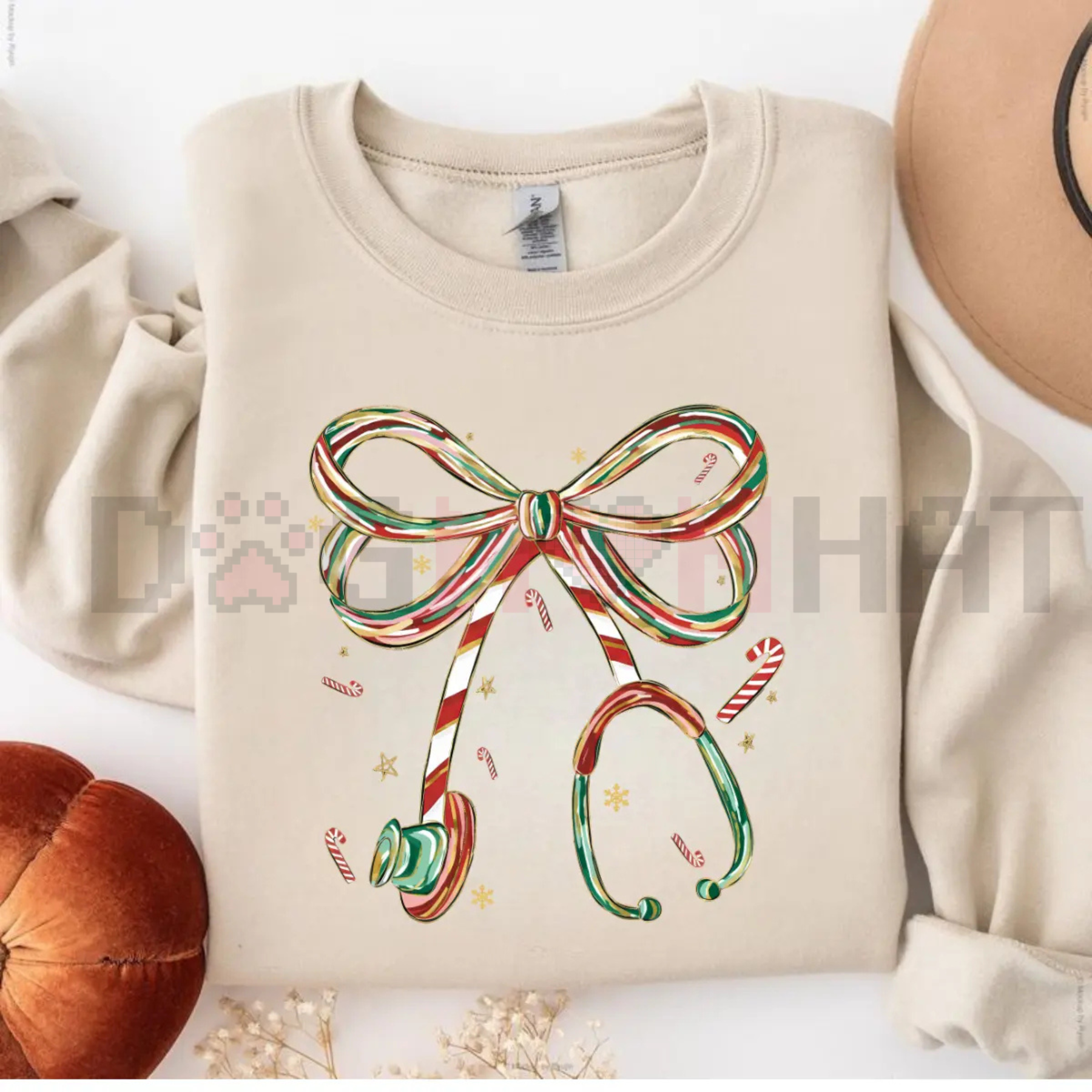 Cream Christmas nurse sweatshirt with colorful bow and candy cane graphic on front