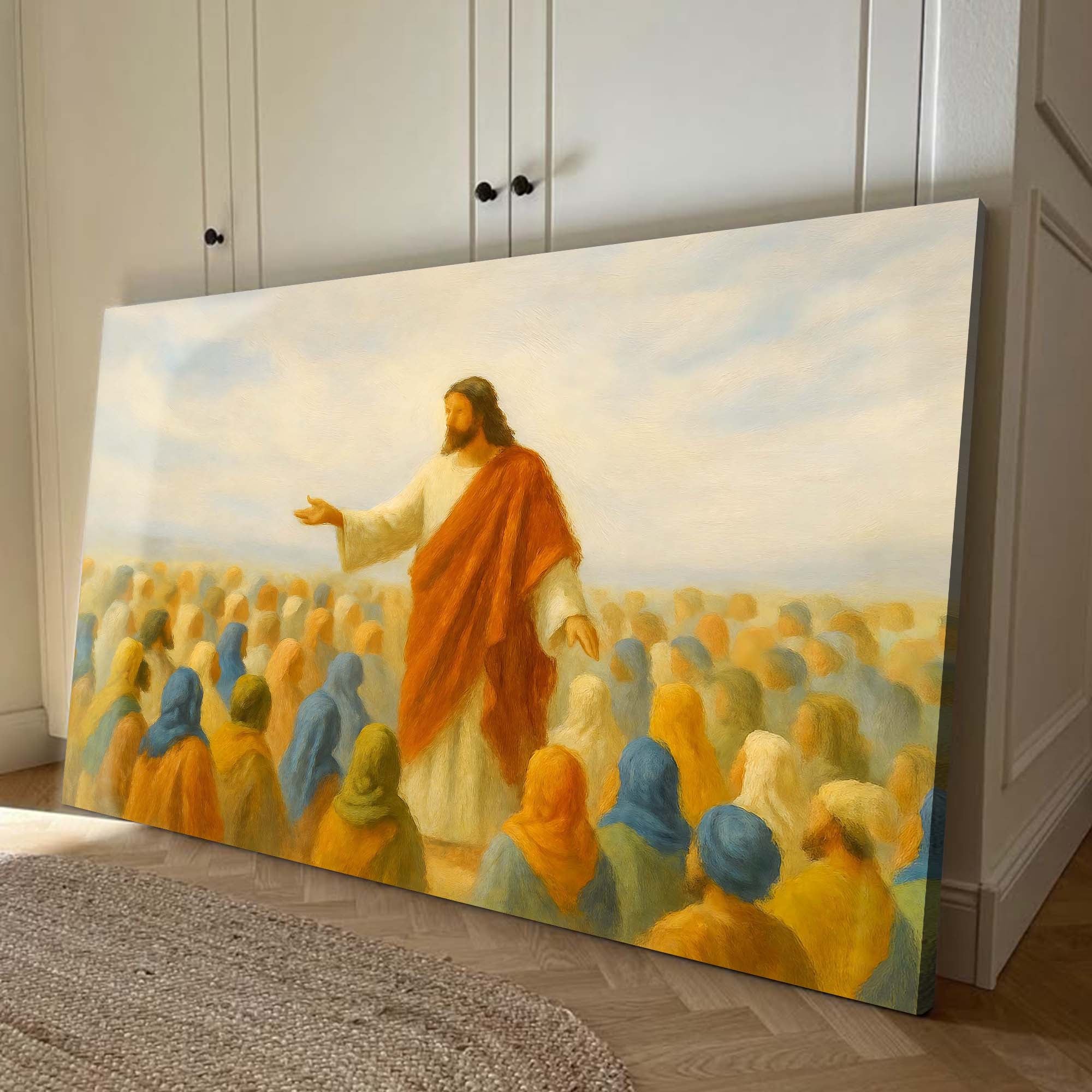 Large faith wall art canvas leaning against wall, showing Jesus in an orange robe